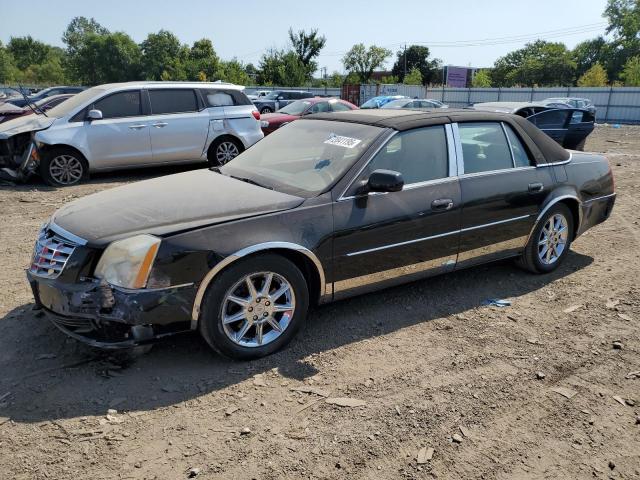 CADILLAC DTS LUXURY 2011 with VIN 1G6KD5E68BU124751 - Photo from auction
