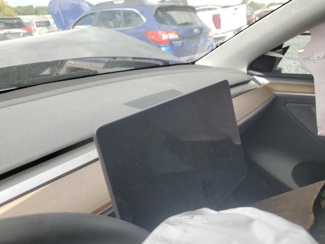 Photo 9 from auction – 2023 TESLA MODEL Y with VIN 7SAYGAEE8PF830989