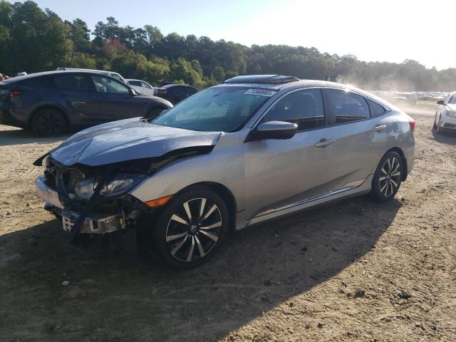 HONDA CIVIC EX 2017 with VIN 19XFC2F74HE220987 - Photo from auction