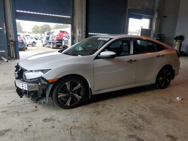 HONDA CIVIC TOURING 2017 with VIN 19XFC1F94HE213856 - Photo from auction