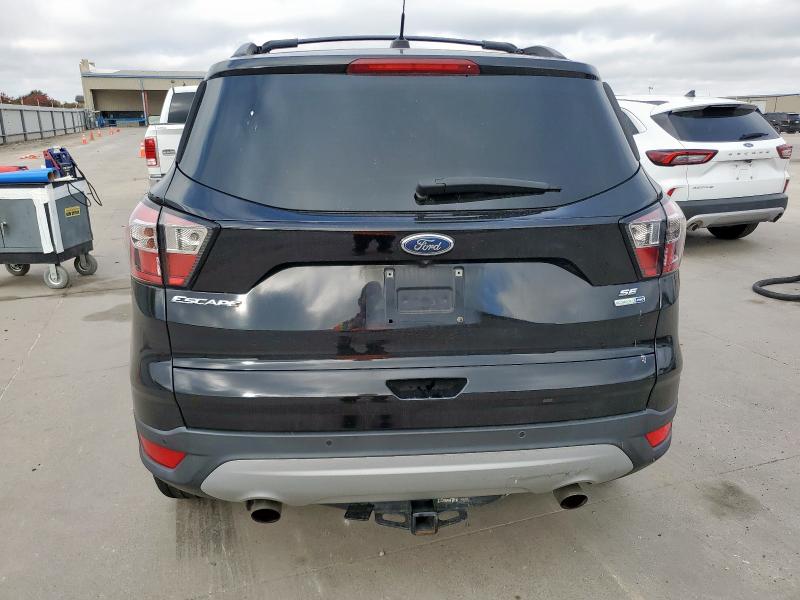 Photo 6 from auction – 2017 FORD ESCAPE SE with VIN 1FMCU9G96HUC17613