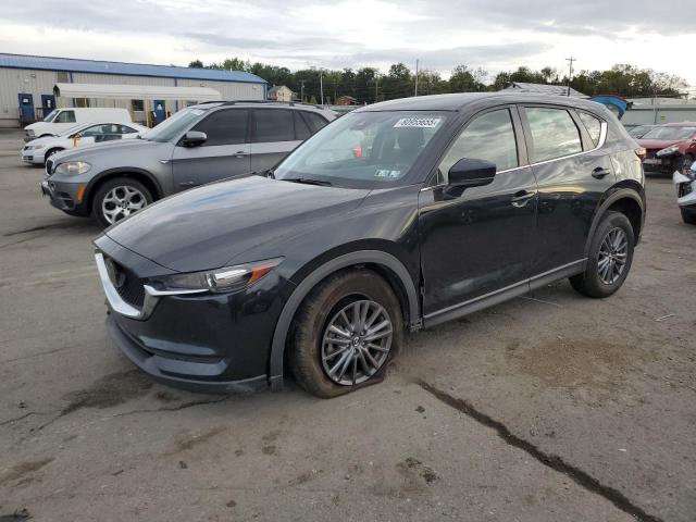 MAZDA CX-5 SPORT 2021 with VIN JM3KFBBM7M0350581 - Photo from auction