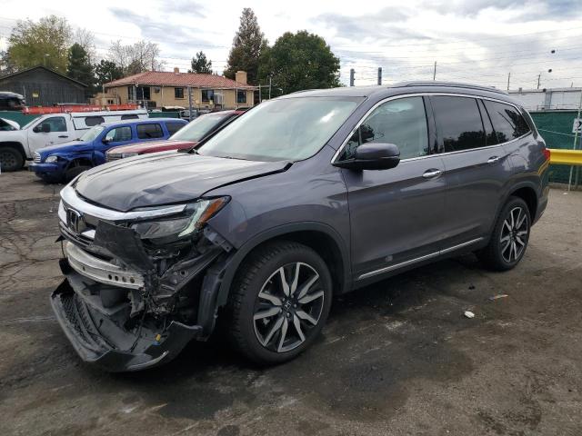 HONDA PILOT TOUR 2022 with VIN 5FNYF6H96NB037232 - Photo from auction