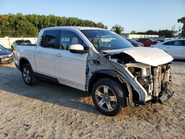 Photo 4 from auction – 2024 HONDA RIDGELINE with VIN 5FPYK3F51RB011841