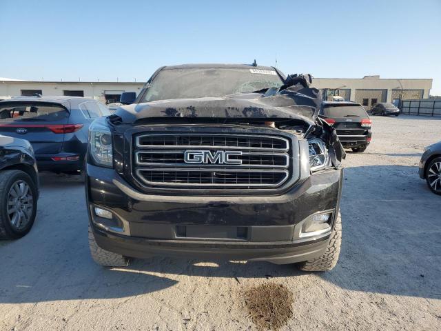 Photo 5 from auction – 2019 GMC YUKON SLT with VIN 1GKS2BKC6KR101214