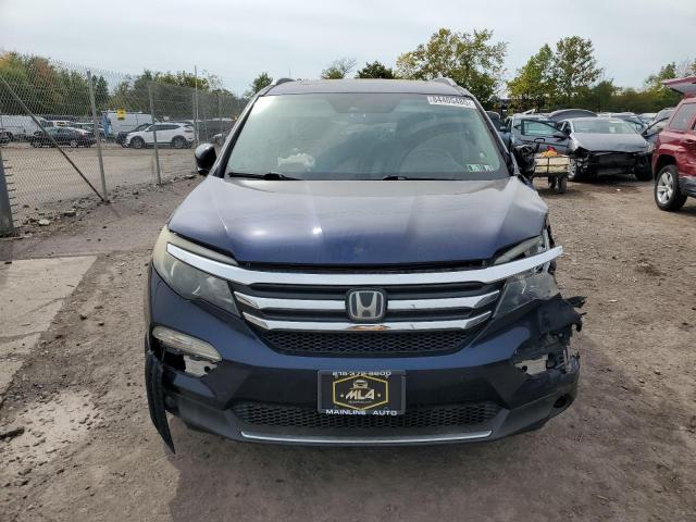 Photo 5 from auction – 2016 HONDA PILOT with VIN 5FNYF6H99GB055257