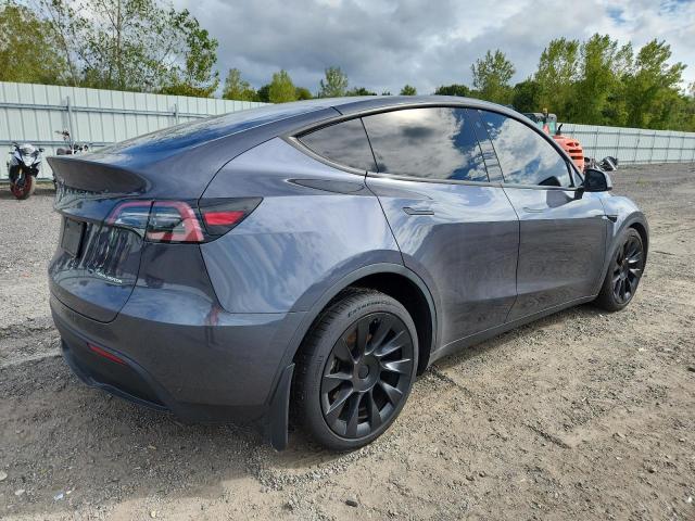 Photo 3 from auction – 2023 TESLA MODEL Y with VIN 7SAYGDEE1PF619151