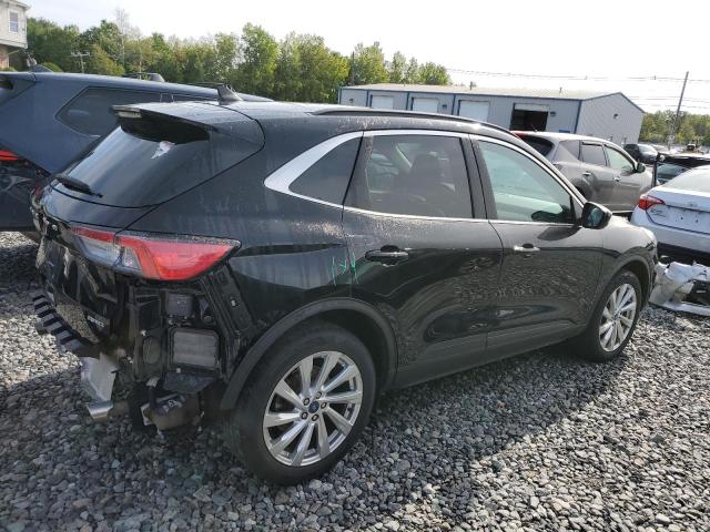 Photo 3 from auction – 2021 FORD ESCAPE TITANIUM with VIN 1FMCU9J97MUA62699