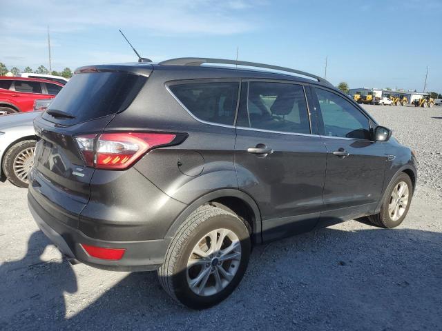 Photo 3 from auction – 2018 FORD ESCAPE SE with VIN 1FMCU0GD5JUC55291