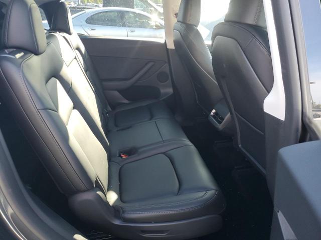Photo 11 from auction – 2023 TESLA MODEL Y with VIN 7SAYGAEE0PF864389
