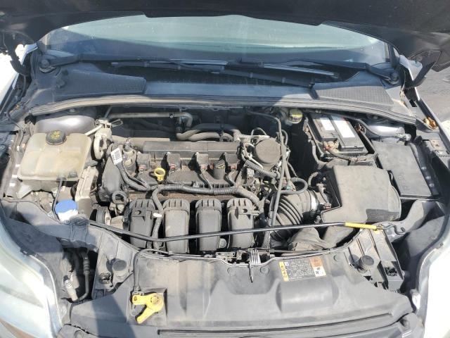 Фото 11 с аукциона – 2014 FORD FOCUS SE с VIN 1FADP3K2XEL447587