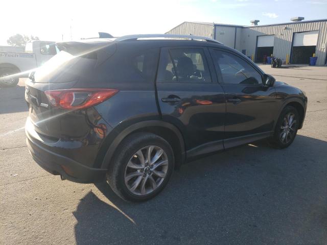 Photo 3 from auction – 2014 MAZDA CX-5 GT with VIN JM3KE2DYXE0398869