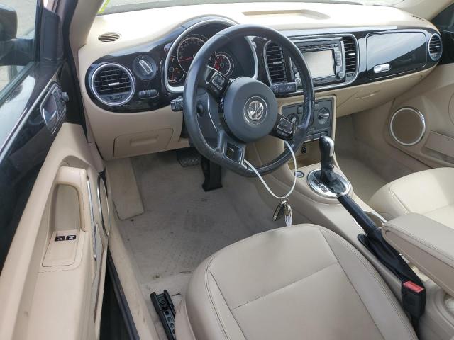 Photo 8 from auction – 2014 VOLKSWAGEN BEETLE with VIN 3VWJP7AT5EM613525