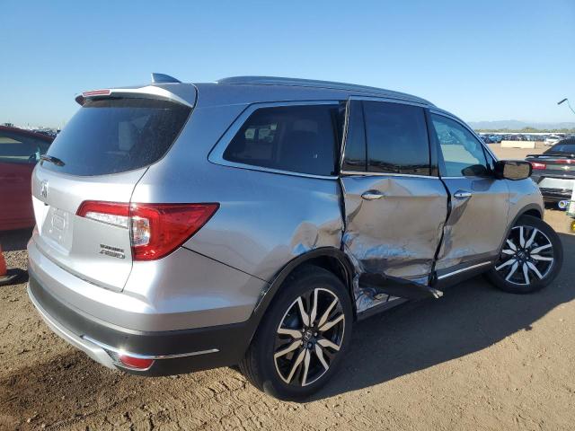 Photo 3 from auction – 2021 HONDA PILOT TOURING with VIN 5FNYF6H67MB034473