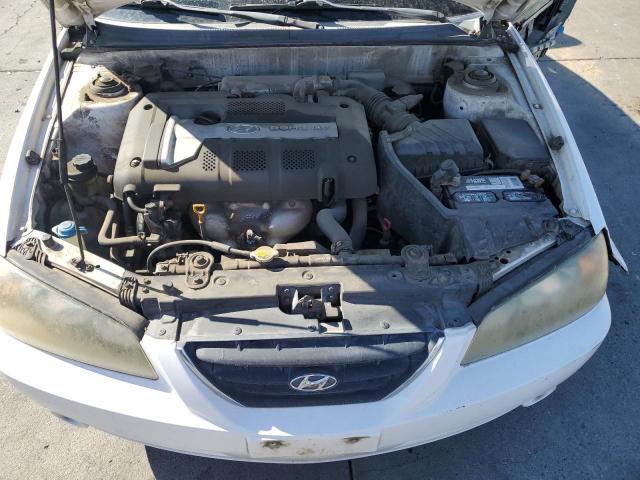 Photo 11 from auction – 2004 HYUNDAI ELANTRA GL with VIN KMHDN46D34U725333