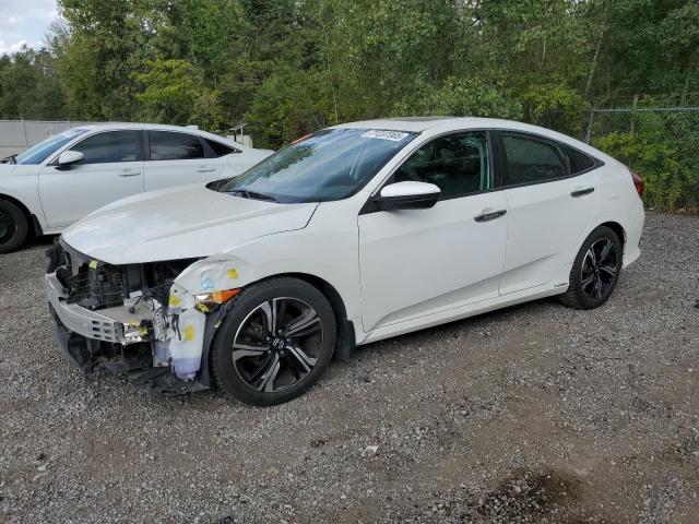 HONDA CIVIC TOUR 2016 with VIN 2HGFC1F95GH103855 - Photo from auction