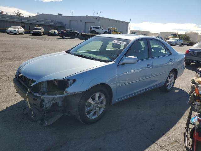 TOYOTA CAMRY LE 2005 with VIN 4T1BF30K95U618472 - Photo from auction
