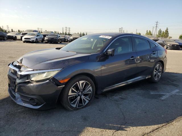 Photo 1 from auction – 2018 HONDA CIVIC EXL with VIN 2HGFC1F77JH640488