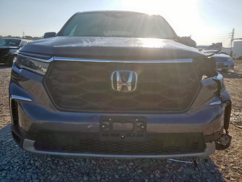 Photo 5 from auction – 2023 HONDA PILOT EXL with VIN 5FNYG1H43PB015700