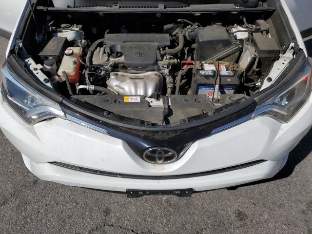 Photo 12 from auction – 2017 TOYOTA RAV4 LE with VIN JTMZFREV9HJ715962