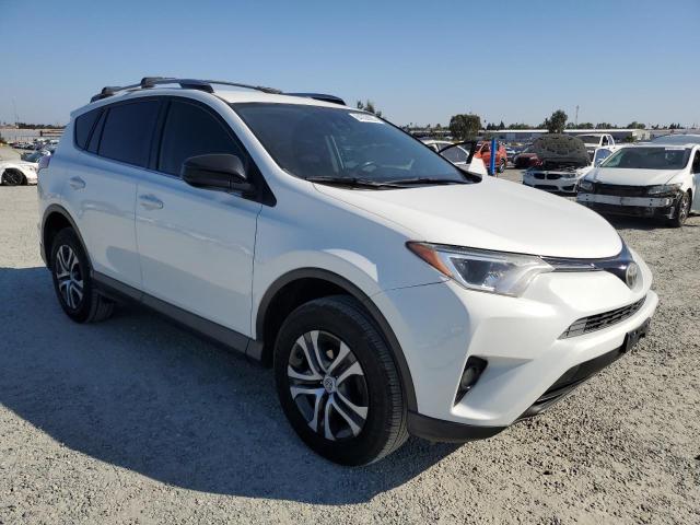 Photo 4 from auction – 2017 TOYOTA RAV4 LE with VIN JTMZFREV8HJ104031