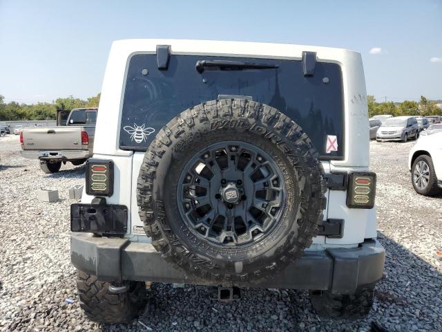 Photo 6 from auction – 2011 JEEP WRANGLER U with VIN 1J4HA5H12BL561760