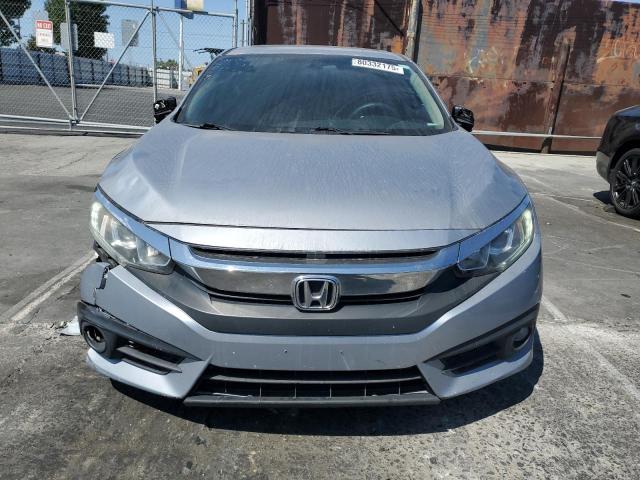 Photo 5 from auction – 2017 HONDA CIVIC EX with VIN 2HGFC1F35HH659113
