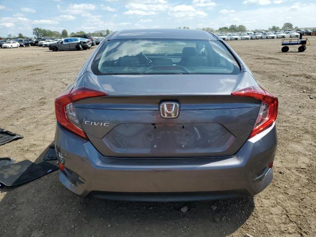Photo 6 from auction – 2018 HONDA CIVIC LX with VIN 19XFC2F57JE034185