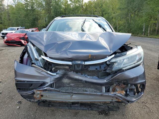 Photo 5 from auction – 2016 HONDA CR-V LX with VIN 2HKRM4H32GH131901