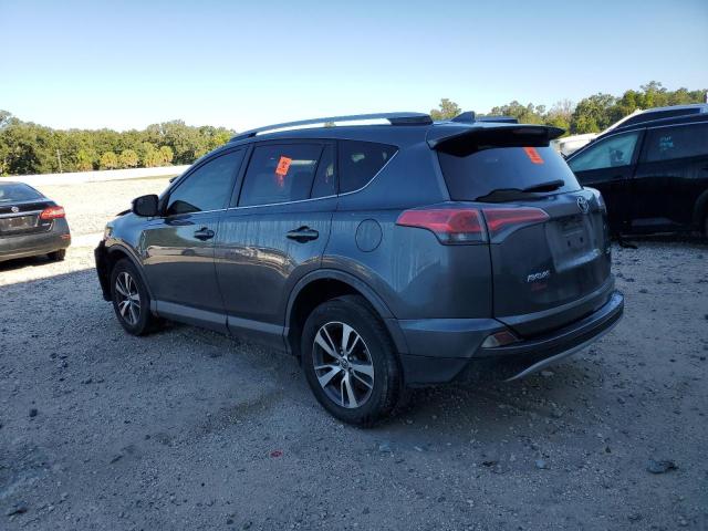 Photo 2 from auction – 2017 TOYOTA RAV4 XLE with VIN JTMWFREV6HD093077