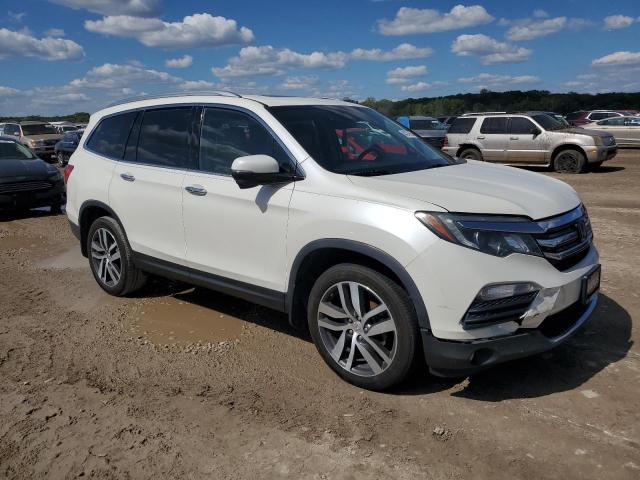 Photo 4 from auction – 2017 HONDA PILOT TOURING with VIN 5FNYF6H96HB003988