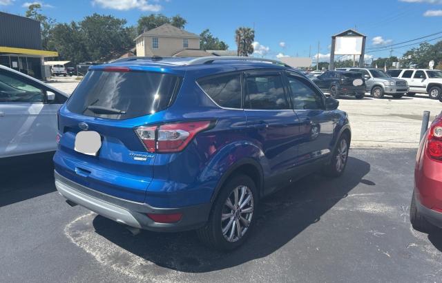 Photo 4 from auction – 2017 FORD ESCAPE TIT with VIN 1FMCU9J95HUD95912