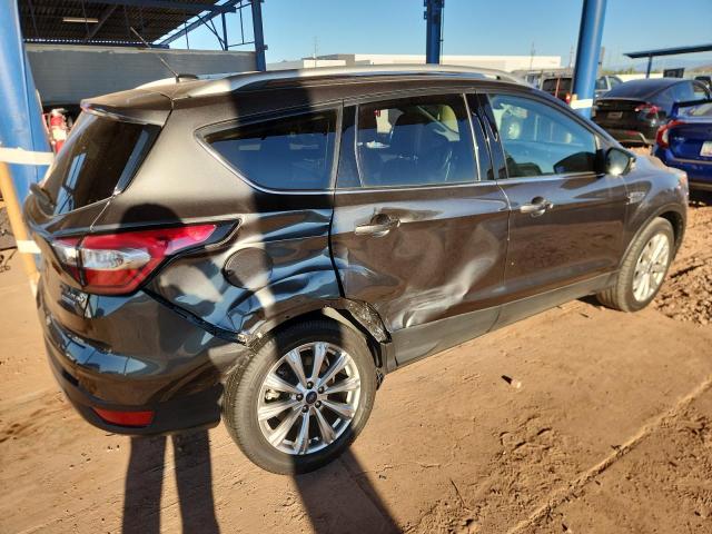 Photo 3 from auction – 2017 FORD ESCAPE TITANIUM with VIN 1FMCU9J9XHUC51563