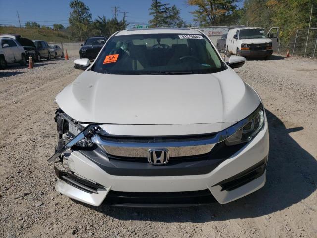 Photo 5 from auction – 2018 HONDA CIVIC EX with VIN 19XFC2F78JE031300