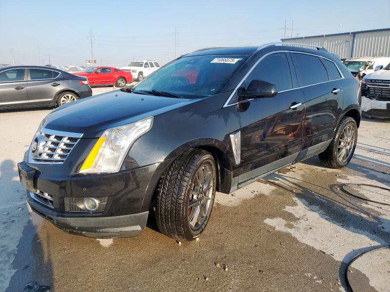 CADILLAC SRX PREMIU 2015 with VIN 3GYFNDE31FS623239 - Photo from auction