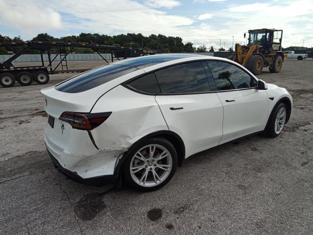 Photo 3 from auction – 2022 TESLA MODEL Y with VIN 7SAYGDEE5NF394553