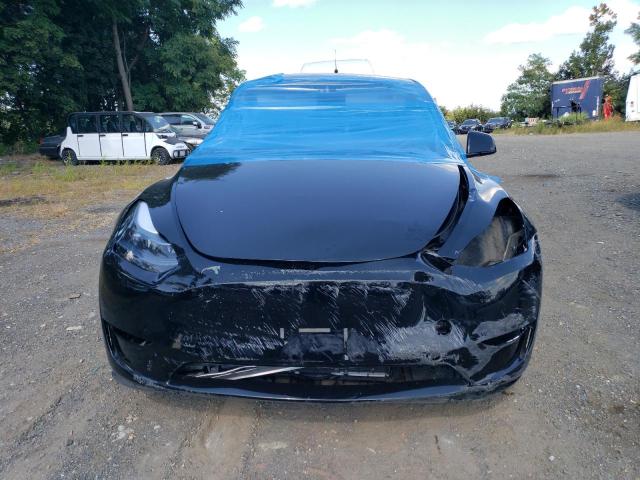Photo 5 from auction – 2024 TESLA MODEL Y with VIN 7SAYGDEE7RA327259