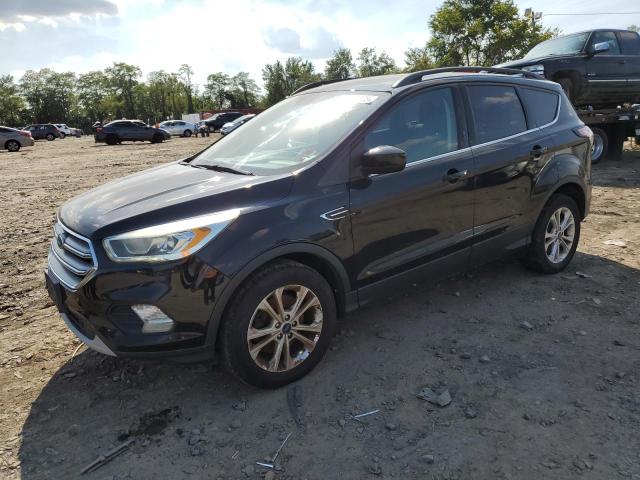 FORD ESCAPE SE 2017 with VIN 1FMCU9G95HUD03043 - Photo from auction