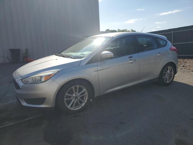 FORD FOCUS SE 2016 with VIN 1FADP3K28GL323563 - Photo from auction