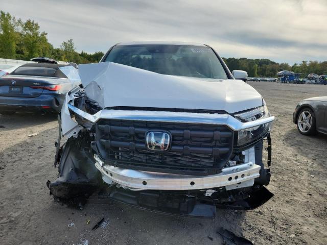 Photo 5 from auction – 2025 HONDA RIDGELINE with VIN 5FPYK3F57SB032490