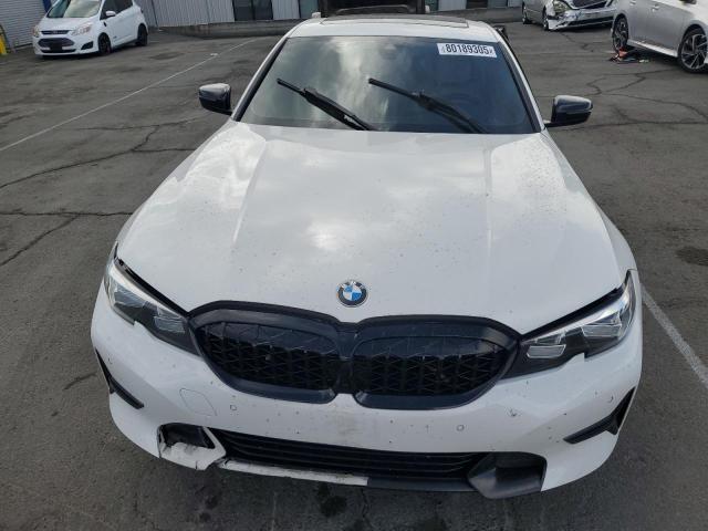 Photo 5 from auction – 2019 BMW 330I with VIN WBA5R1C50KAK07944