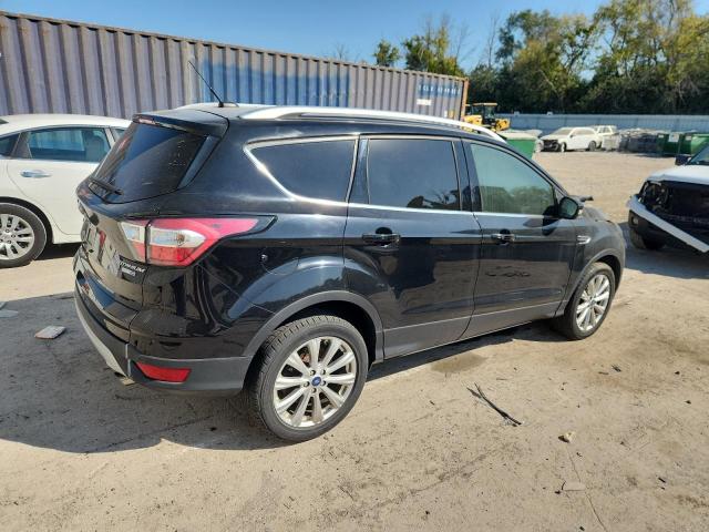 Photo 3 from auction – 2017 FORD ESCAPE TIT with VIN 1FMCU9JD7HUC94987