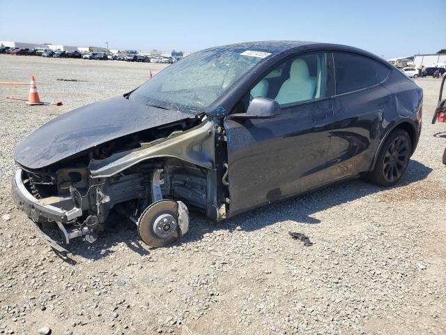 TESLA MODEL Y 2024 with VIN 7SAYGDEE8RF063701 - Photo from auction