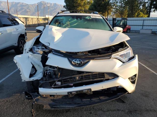 Photo 5 from auction – 2016 TOYOTA RAV4 LIMIT with VIN JTMYFREV6GJ080757