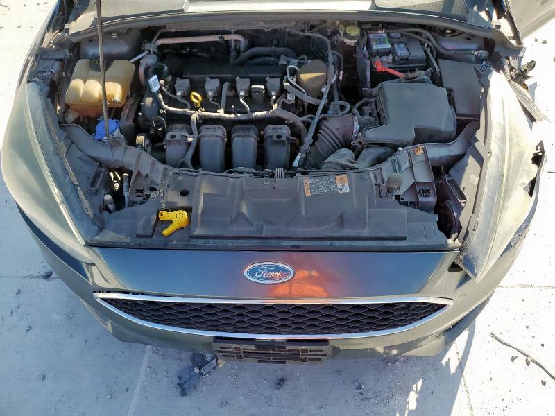 Photo 11 from auction – 2015 FORD FOCUS SE with VIN 1FADP3K2XFL319318