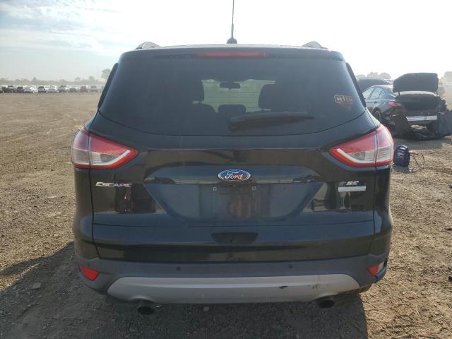 Photo 6 from auction – 2016 FORD ESCAPE SE with VIN 1FMCU0GX1GUB95397