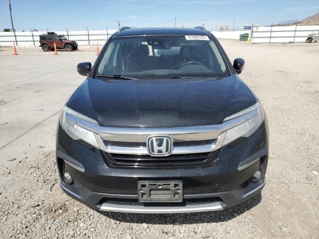 Photo 5 from auction – 2021 HONDA PILOT ELITE with VIN 5FNYF6H05MB088091