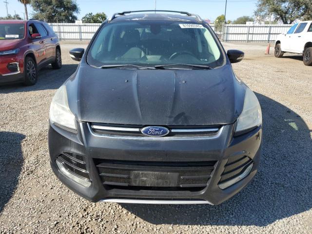 Photo 5 from auction – 2014 FORD ESCAPE TIT with VIN 1FMCU0J95EUD66062