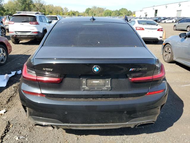 Photo 6 from auction – 2022 BMW M340XI with VIN 3MW5U9J04N8C76740