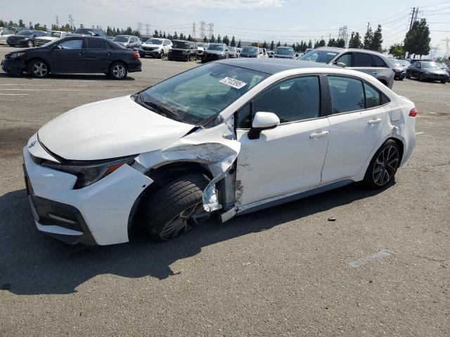 TOYOTA COROLLA SE 2022 with VIN 5YFS4MCE3NP101557 - Photo from auction